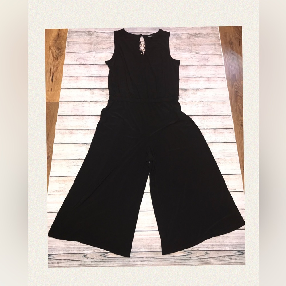 Black Sleeveless Jumpsuit with Gold Rings at the Front Peep Hole